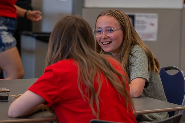 A student helping another student